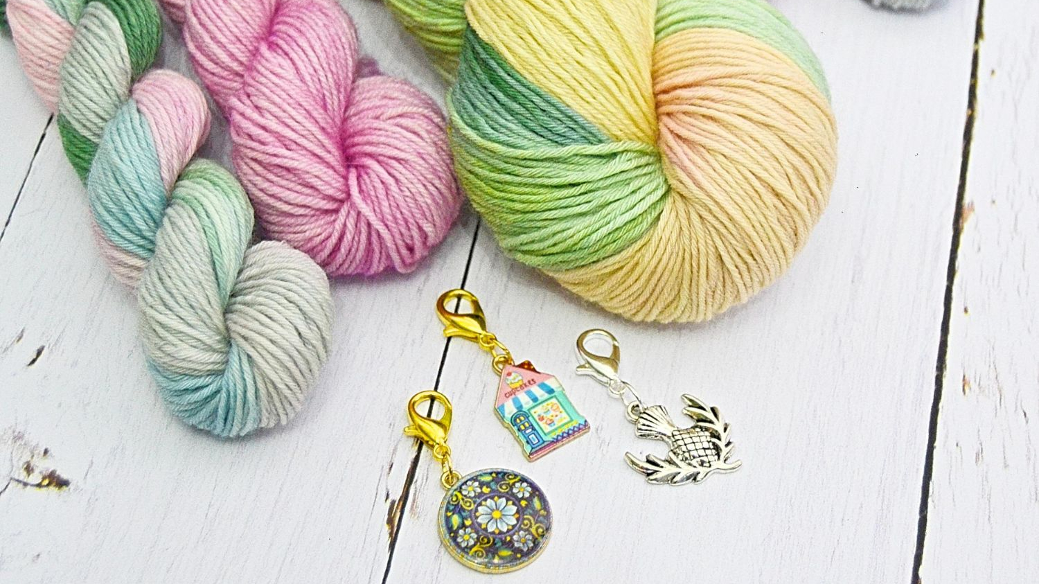 Hand-dyed wool and three classic stitch markers Hand-dyed wool and three classic stitch markers